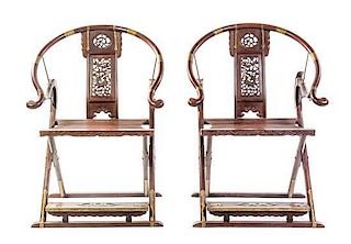 A Pair of Jichimu and Mixed Wood Horseshoe-Back Folding Chairs, Height 43 1/2 x width 30 1/4 x depth 20 3/4 inches.