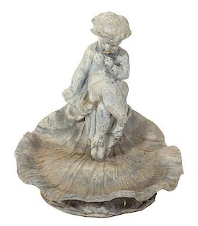 An English Lead Sculpture of a Putto Seated in a Shell Height 17 x width 14 1/2 x depth 13 1/2 inches.