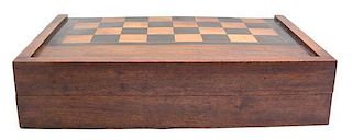 An English Inlaid Mahogany and Stained Backgammon Box Closed, height 4 3/4 x length 21 x depth 14 inches.