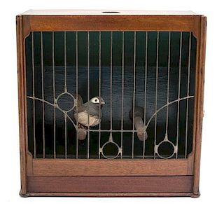 An English Mahogany Travelling Bird Cage Height 10 1/2 x width 10 3/8 x depth 5 inches.