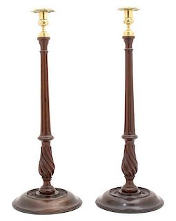 A Pair of Regency Brass Mounted Mahogany Candlesticks Height 21 1/4 inches.