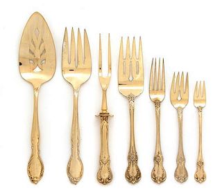 An American Silver and Gilt Wash Partial Flatware Service, Towle, 20th Century, comprising: 8 luncheon knives 8 salad forks 7
