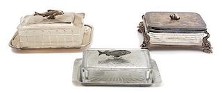 Three Silver Plate and Glass Covered Boxes with Stands Length of larger 7 inches.