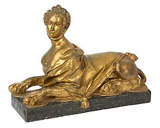 A Directoire Style Gilt Painted Composite Sphinx Height 30 x width 41 x depth 14 inches.