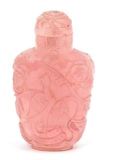 A Carved Rose Quartz Snuff Bottle Height 3 1/4 inches.