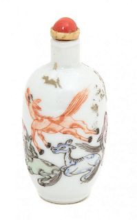 An Enamel Painted Porcelain Snuff Bottle Height 2 5/8 inches.