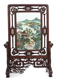 A Chinese Famille Rose Porcelain Inset Hardwood Table Screen Height 21 1/2 x width 16 1/2 inches.