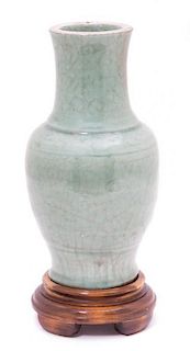 A Chinese Longquan Celadon Glazed Porcelain Vase Height 9 1/2 inches.