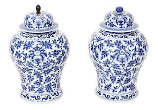 A Pair of Asian Export Blue and White Porcelain Baluster Urns Height 19 1/2 inches.