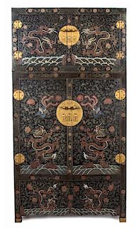 A Chinese Polychromed Lacquer Tall Cabinet Height 94 x width 46 x depth 23 inches.