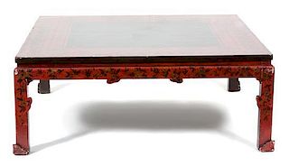An Asian Style Red Lacquer Low Table Height 16 x width 44 inches.