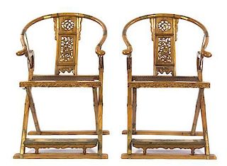 A Pair of Elm Wood Horseshoe-Back Folding Armchairs, Height 43 x width 27 1/2 x depth 20 inches.