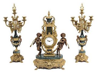 An Italian Louis XV Style Gilt Metal Mounted Verde Marble Clock Garniture Height of clock 24 inches.