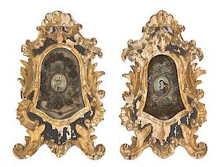 A Pair of Italian Baroque Carved and Painted Giltwood Retablo Height 14 x width 9 x depth 1 1/2 inches.