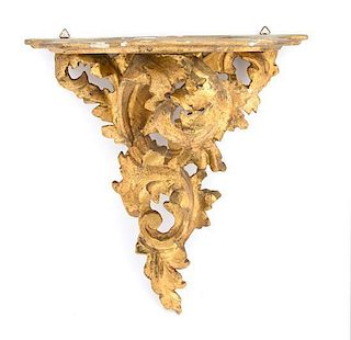 A Louis XV Style Carved Giltwood Wall Bracket Height 11 x width 11 x depth 5 3/4 inches.