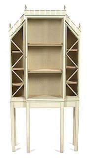 A Louis XVI Style Painted Breakfront Display Cabinet-on-Stand Height 76 1/2 x width 36 1/2 x depth 11 1/4 inches.