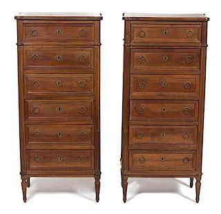 A Pair of Louis XVI Style Walnut Tall Chests of Six Drawers Height 49 3/4 x width 22 1/2 x depth 14 3/4 inches.