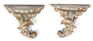 A Pair of Carved Silvered Wood Wall Brackets Height 10 3/4 x width 12 1/4 x depth 7 1/2 inches.