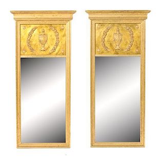 A Pair of Neoclassical Style Giltwood Pier Mirrors Height 49 1/2 x width 16 1/2 inches.