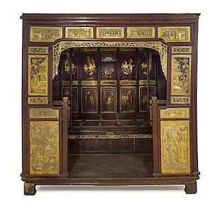 A Chinese Gilt Paint and Red Lacquer Opium Bed, Height 84 x width 84 x depth 95 inches.