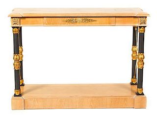 An Empire Style Oak and Partially Ebonized Console Table height 35 x width 50 1/2 x 17 1/2 inches.