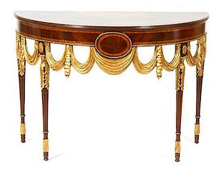 A Neoclassical Style Inlaid Mahogany and Parcel Gilt Console Table Height 33 1/4 x width 43 1/2 x depth 24 inches.