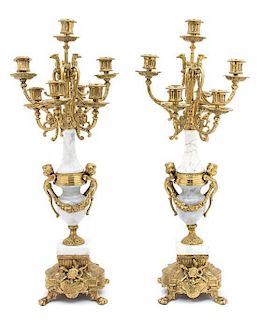 A Pair of French Ormolu and Onyx Seven-Light Candelabra Height 24 inches.