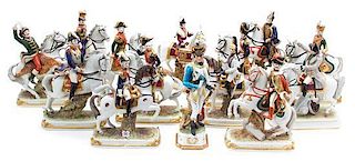 An Assembled Group of Thirteen German Porcelain Empire-Style Military Figurines Height of tallest 11 1/2 inches.