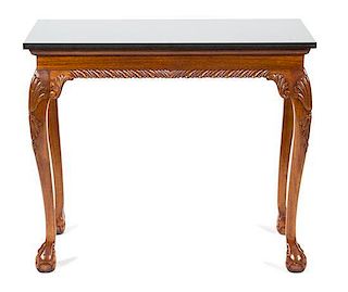 An Irish Chippendale Style Mahogany Side Table Height 31 x width 37 x depth 19 1/2 inches.