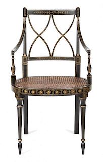 A Regency Ebonized and Gilt Decorated Lady's Open Armchair Height 34 1/2 inches.