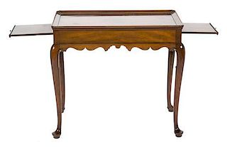A Queen Anne Style Mahogany Silver Table Height 26 1/2 x width 30 x depth 18 1/2 inches.