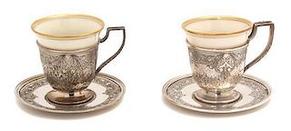 Seven American Silver Demitasse Cups and Undertrays, , having overall etched floral and hand hammered decoration, with Lenox 