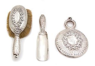 An American Silver Vanity Set, Tiffany & Co., New York, NY, monogrammed EHF, comprising a hair brush, mirror and shoe horn