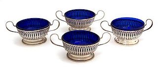 A Group of Twelve Silver Ramekin Holders with Cobalt Blue Glass Liners, Unknown Maker, having two handles with reticulated si