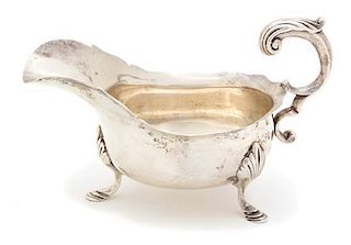 Four American Silver Articles, Various Makers, comprising a treen handled silent butler, two Dominic & Haff bowls, and a pair