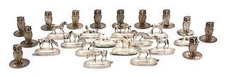 A Collection of Continental Silver Plate Place Card Holders, , comprising fourteen equestrian themed and twelve of owl-form.
