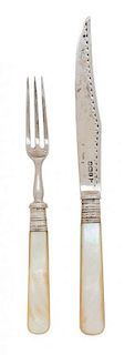 A Set of English Silver and Mother-of-Pearl Handled Cutlery Service Length of knife 7 1/2 inches.