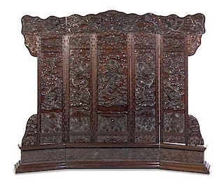 A Chinese Carved Hardwood Five-Panel Screen, Height 88 x width 103 x depth 10 1/4 inches.