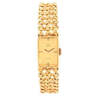 Lady's Vintage Omega De Ville 18 Karat Yellow Gold Bracelet Watch with Manual Movement. Stamped 750
