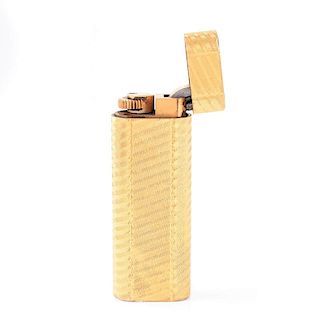Vintage Cartier Gold Plated Butane Lighter. Signed. Normal surface wear. Measures 2-3/4" H, 1" W. A