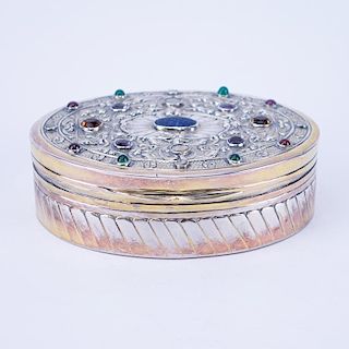 Antique 800 Silver Oval Jeweled Box. Vermeil rim, bottom and interior. Marked 800. Light wear. Meas