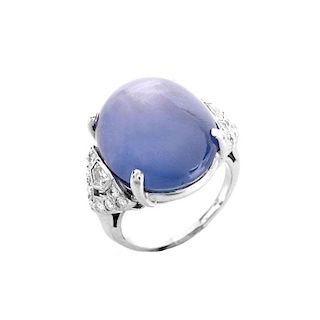 Art Deco Approx. 35.0 Carat Oval Cabochon Star Sapphire, .80 Carat Diamond and Platinum Ring. Sapph