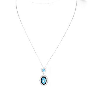 Turquoise, Diamond, Black Onyx and 18 Karat White Gold Pendant Necklace. Clasp stamped 750. Very go