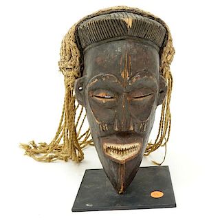 Antique or Later African Chokwe Mask with Headdress on Fitted Metal Stand. Wear and rubbing to wood