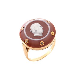 Antique Carved Carnelian, Diamond and 14 Karat Yellow Gold Ring. Stamped 14K. Small losses to carne