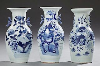 Group of Three Chinese Blue and White Baluster Vases, late 19th c., two with bird and floral decoration and applied dragon ha