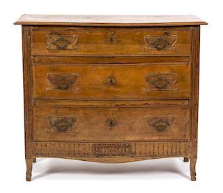 An Italian Carved Three-Drawer Commode Height 37 1/2 x width 44 x depth 17 1/2 inches.
