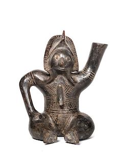 Colima Seated Figure with Left Arm Raised Height 10 x width 8 1/2 x depth 5 1/2 inches