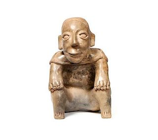 Jalisco Seated Figure Height 10 1/2 x width 6 1/2 x depth 8 inches