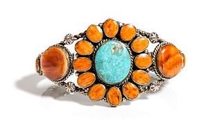 A Southwestern Silver, Turquoise and Spiney Oyster Cuff Bracelet Length 5 1/2 x opening 1 3/8 x width 1 5/8 inches.